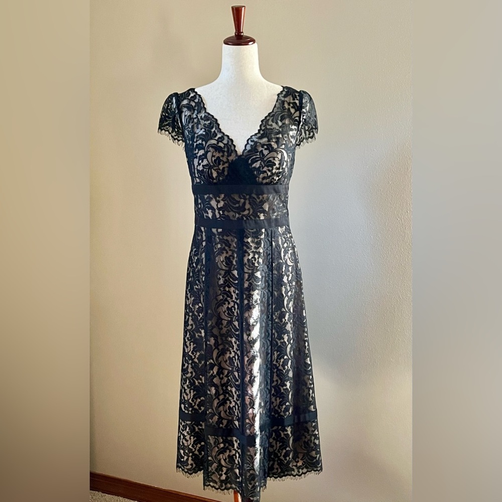 Black lace cocktail dress below knee length with elegant eyelash  lace detail